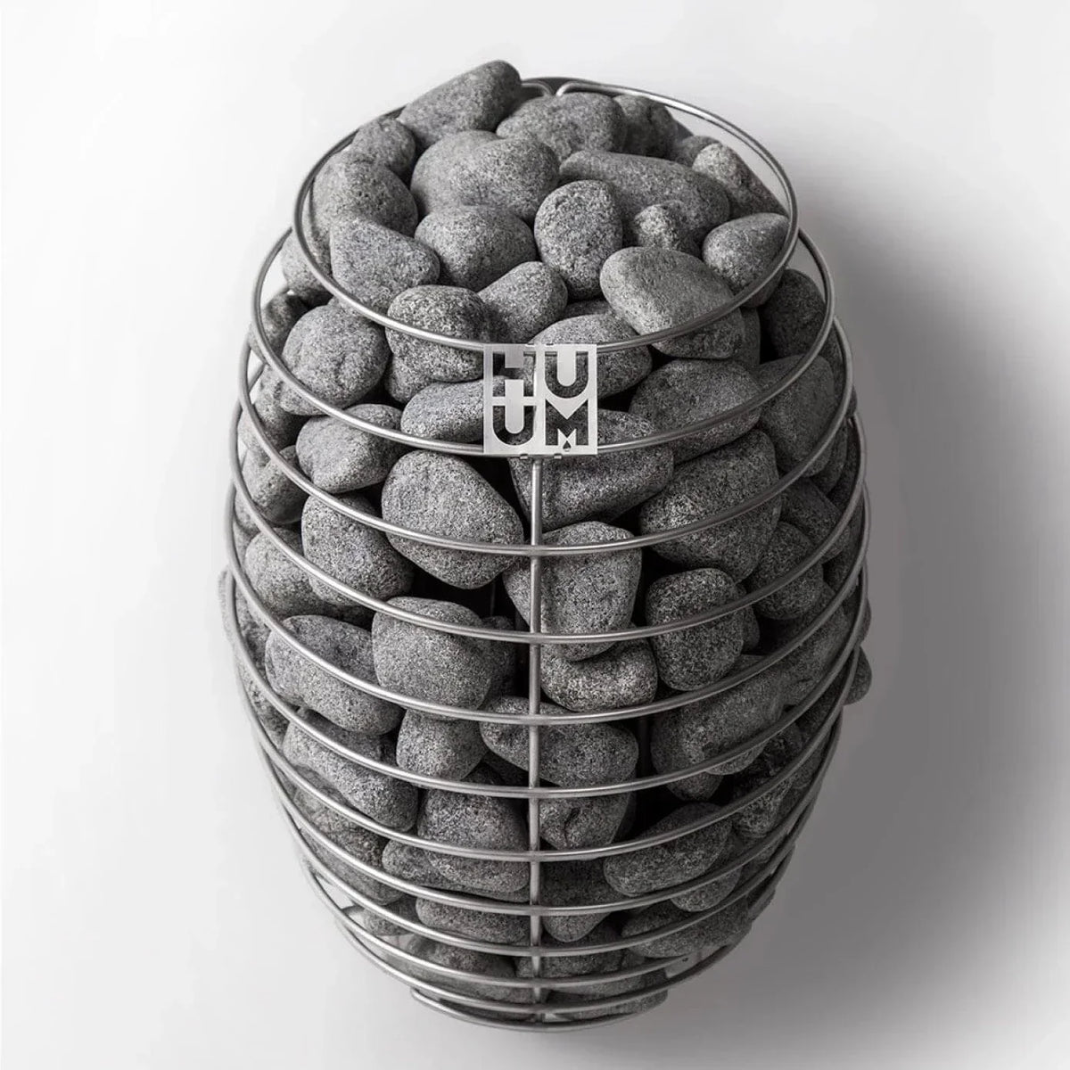 Electric sauna heater filled with gray sauna stones