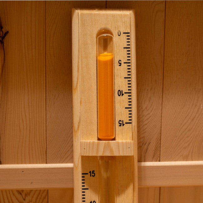 A wooden wall-mounted thermometer with a glass tube filled with orange liquid, showing temperature markings Golden Designs
