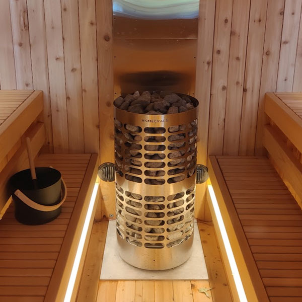 Homecraft Apex electric sauna heater cylinder with stone rocks in warming chamber