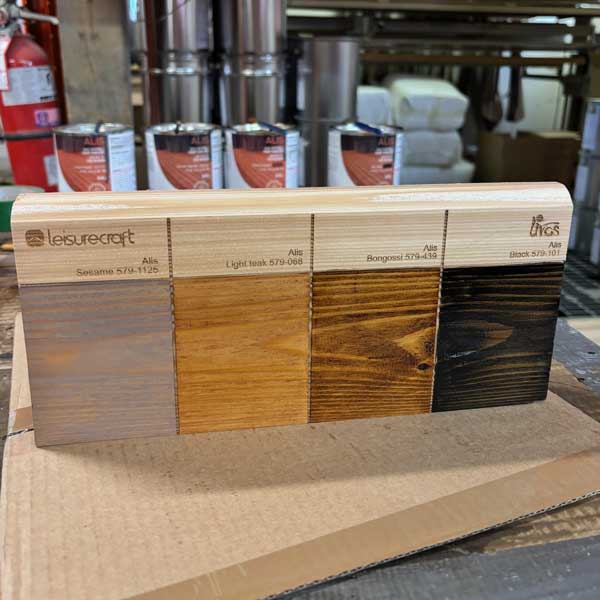 Livos ALIS sauna oil color swatches on wood board: light, medium, and dark/black