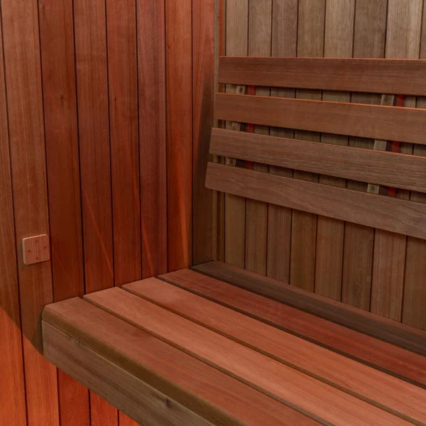 Corner view of wooden sauna bench and wall slats