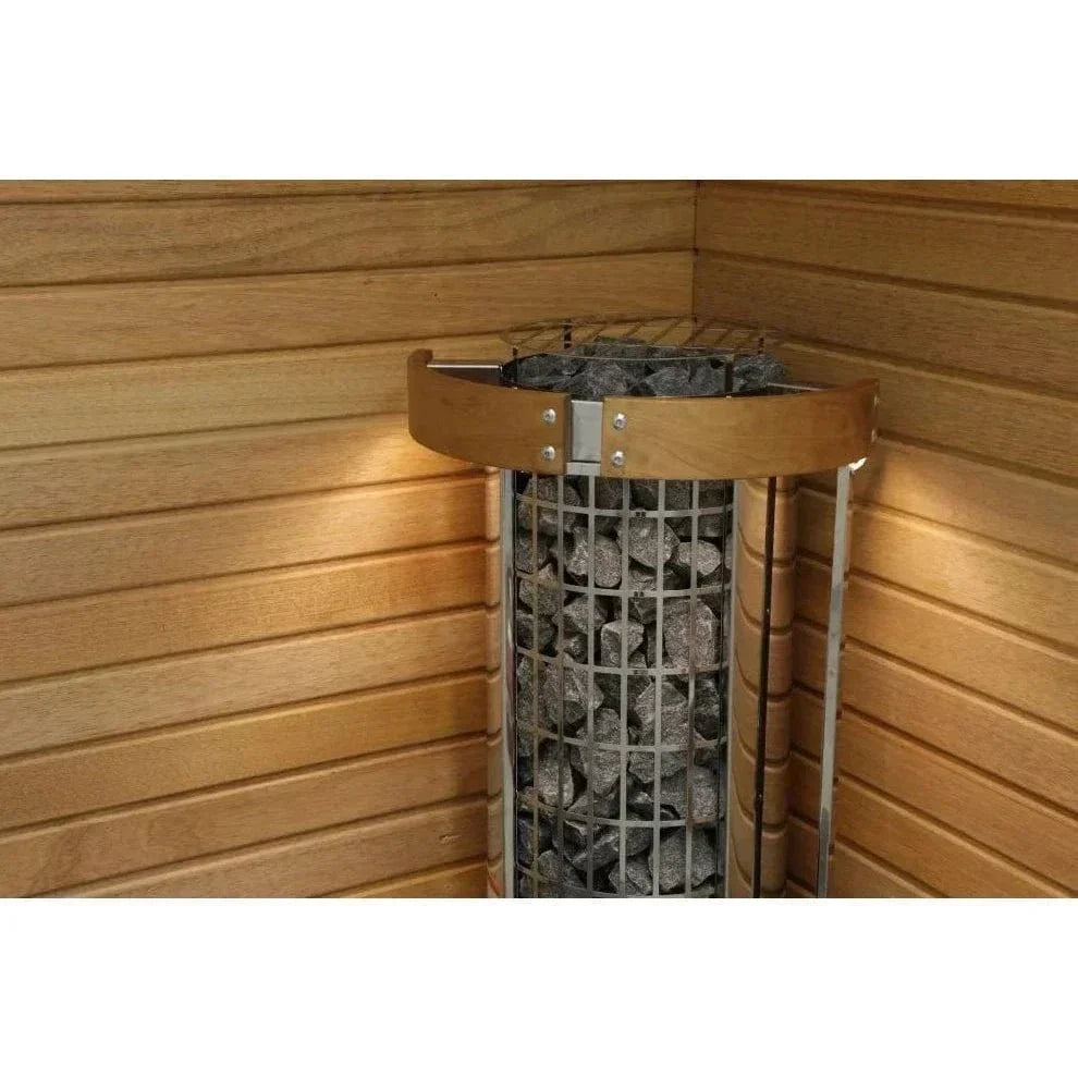 Sauna heater in wooden corner with metal stone basket and curved mounting bars