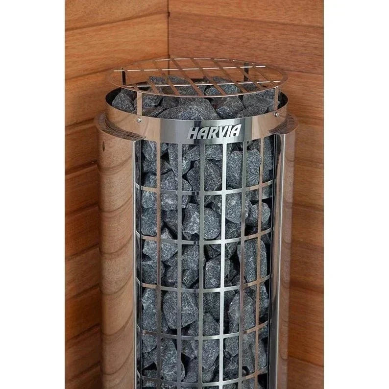 Harvia cylindrical sauna heater with stone-filled metal cylinder inside wood sauna