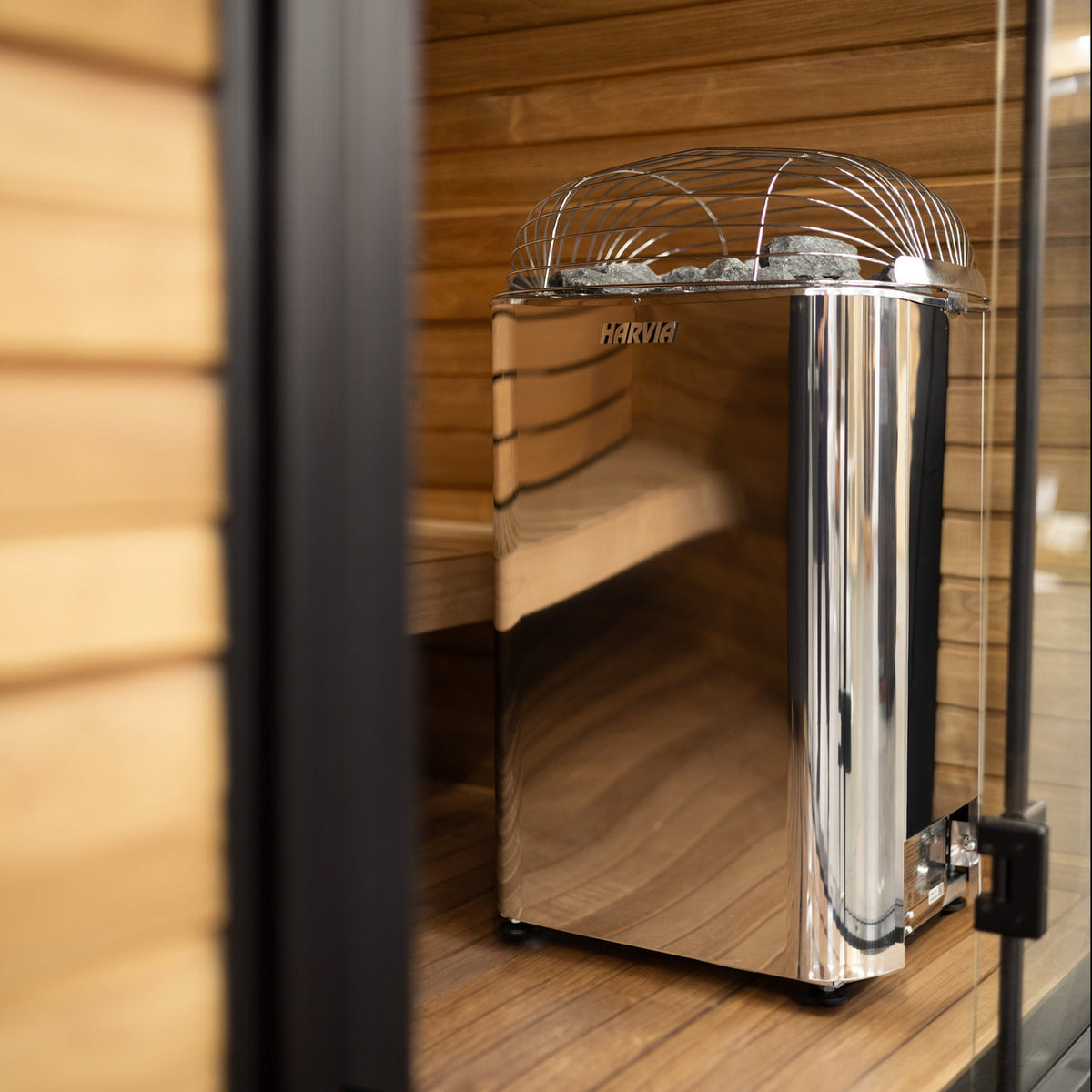 Harvia electric sauna heater unit with stainless steel body and top stone basket