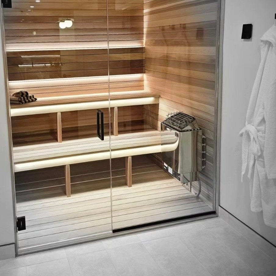 Sauna heater in glass sauna room, with stone rack and control area visible