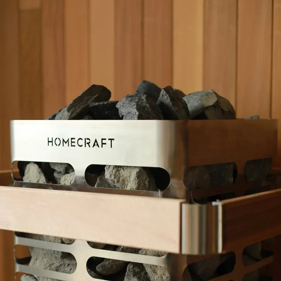 Close-up of Homecraft electric sauna heater front panel with rocks and stainless top