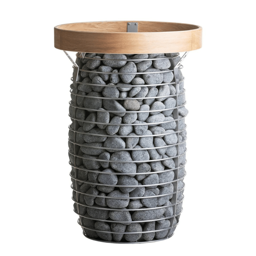 Electric sauna heater drum filled with gray stones and light wood top