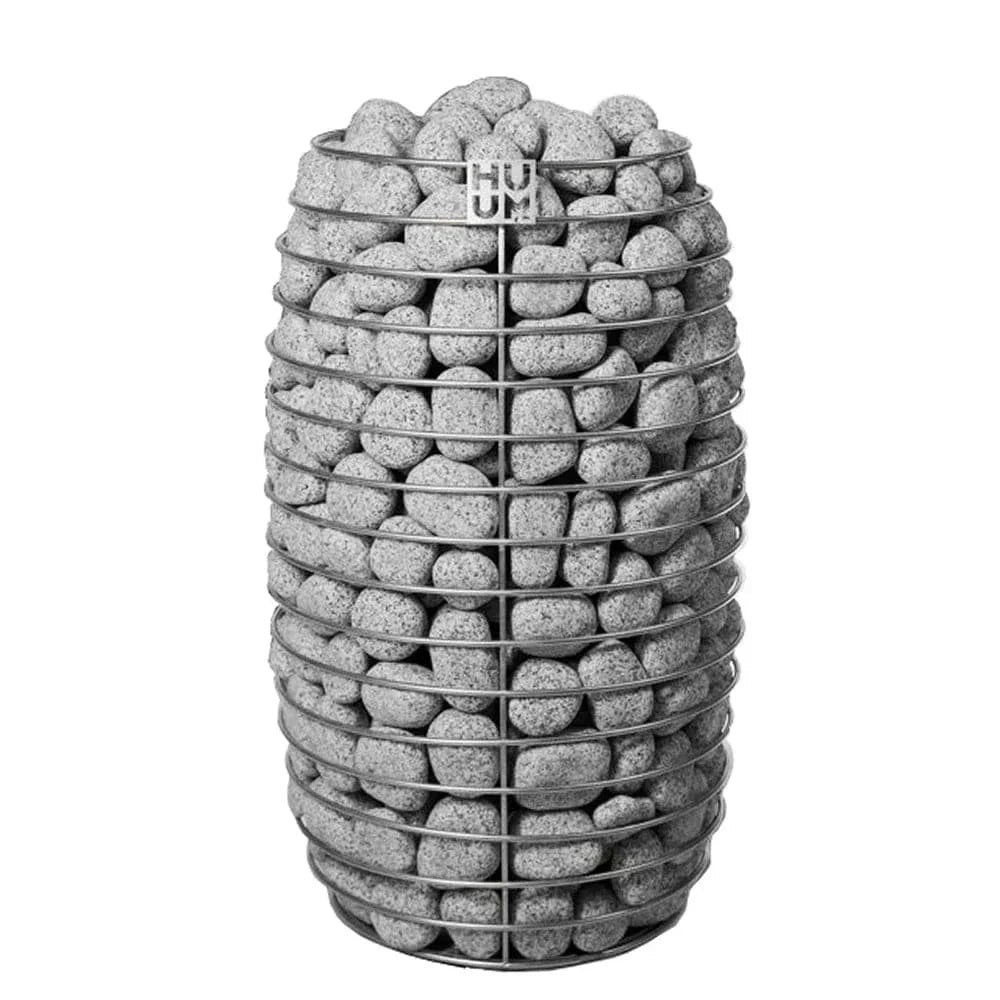 Stacked gray sauna stones for electric sauna heater with protective metal grid